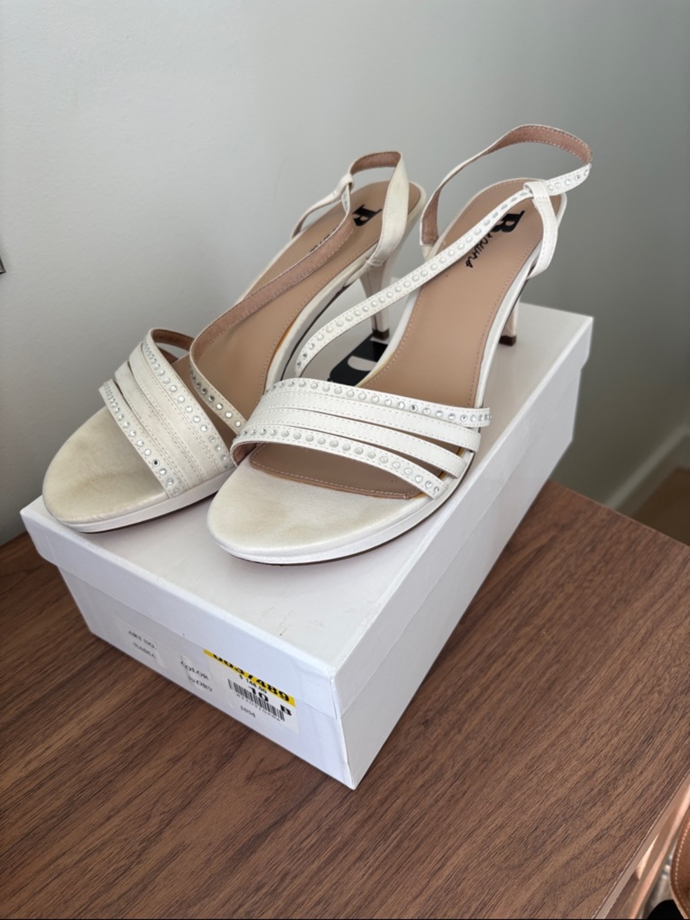 Brown’s Shoes - Women’s Off- White Slingback Heeled Sandals with pretty details.